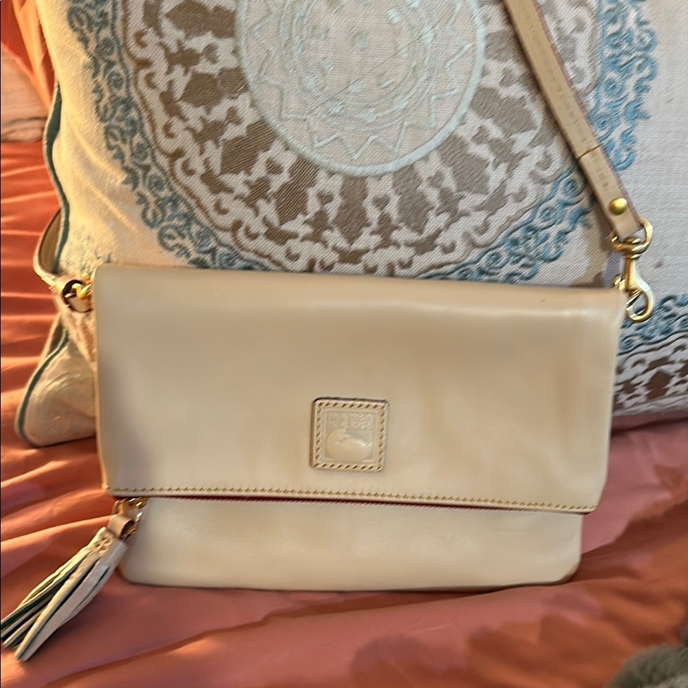 Dooney & Bourke Cream Crossbody Bag with Flap Closure